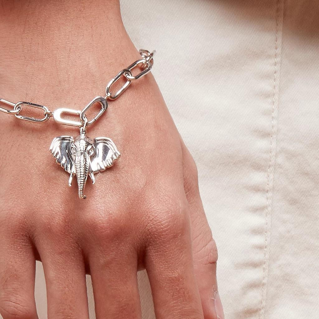 Sterling silver elephant charm bracelet on wrist