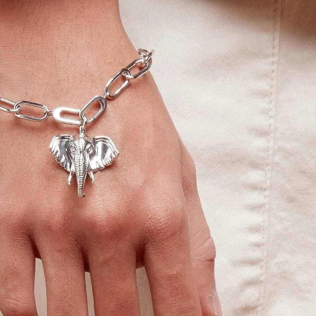 Sterling silver elephant charm bracelet on wrist