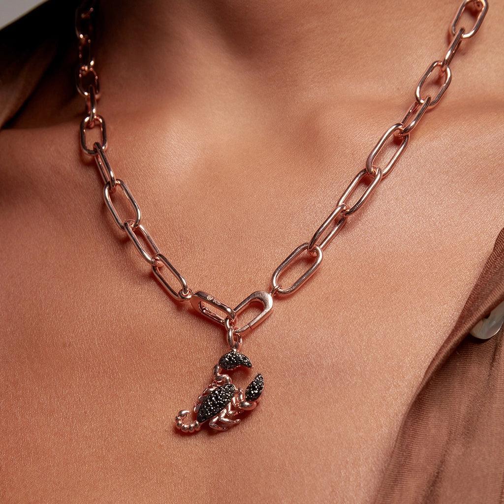 Rose gold chain necklace with black scorpion pcharm