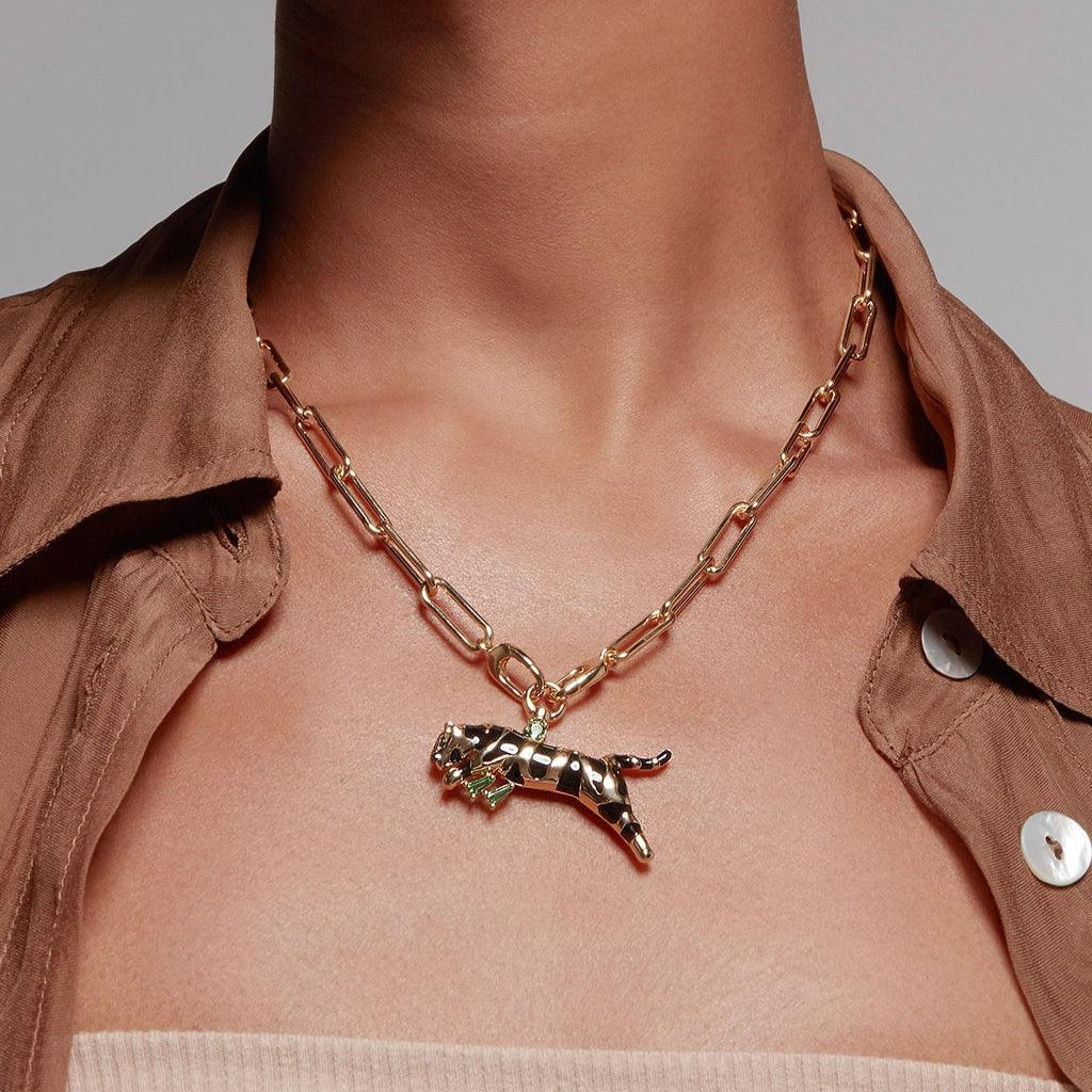 Statement gold paperclip necklace with a large panther charm.