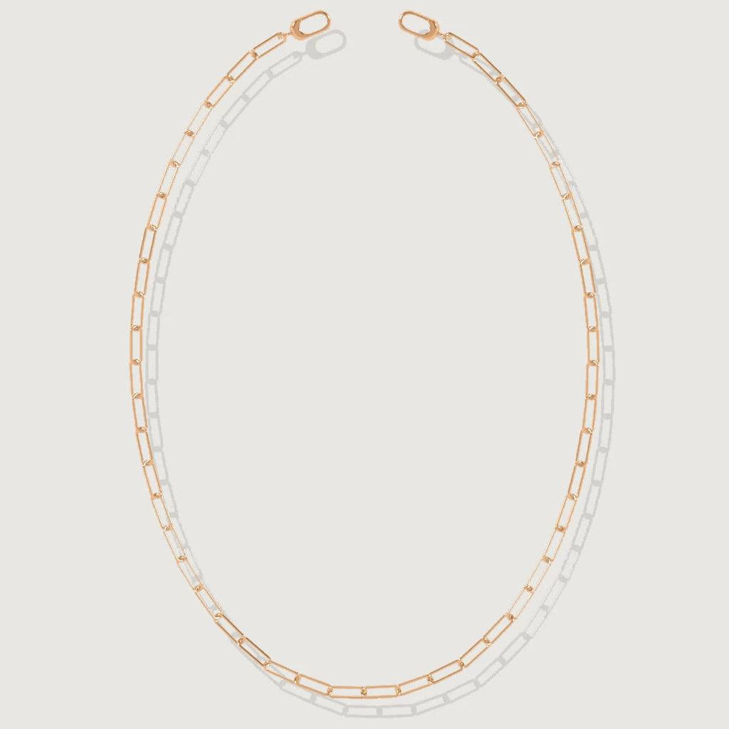 Elegant rose gold paperclip chain necklace laid flat on white background