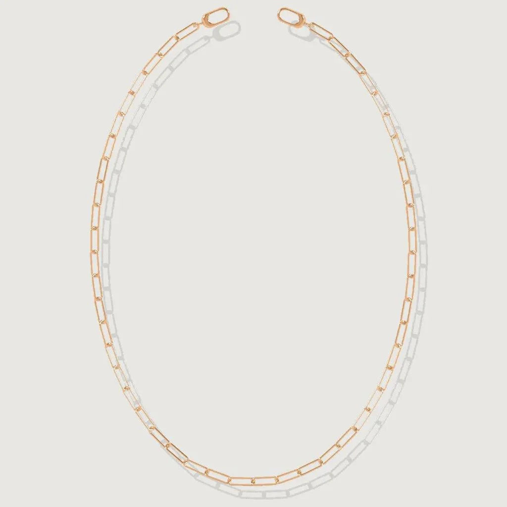 Elegant rose gold paperclip chain necklace laid flat on white background