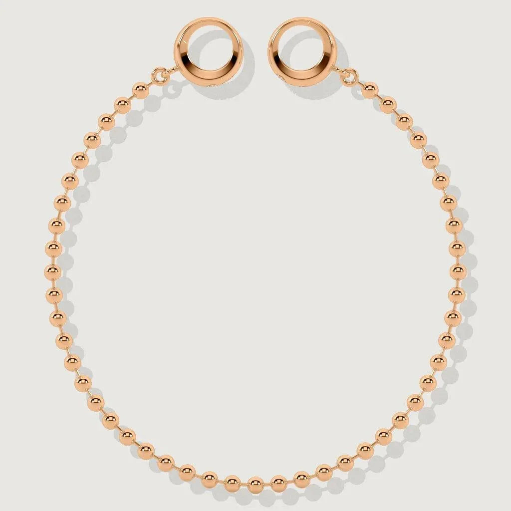 Minimal rose gold bead bracelet with circular clasp displayed on white background