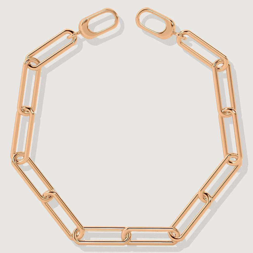 Minimalist rose gold link bracelet in open chain style on white background.