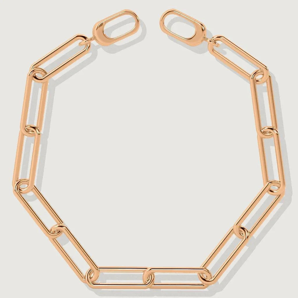 Minimalist rose gold link bracelet in open chain style on white background.