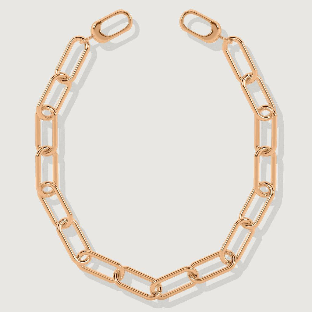 Close-up of a rose gold rectangular link chain bracelet on white background.