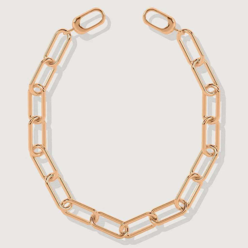 Close-up of a rose gold rectangular link chain bracelet on white background.