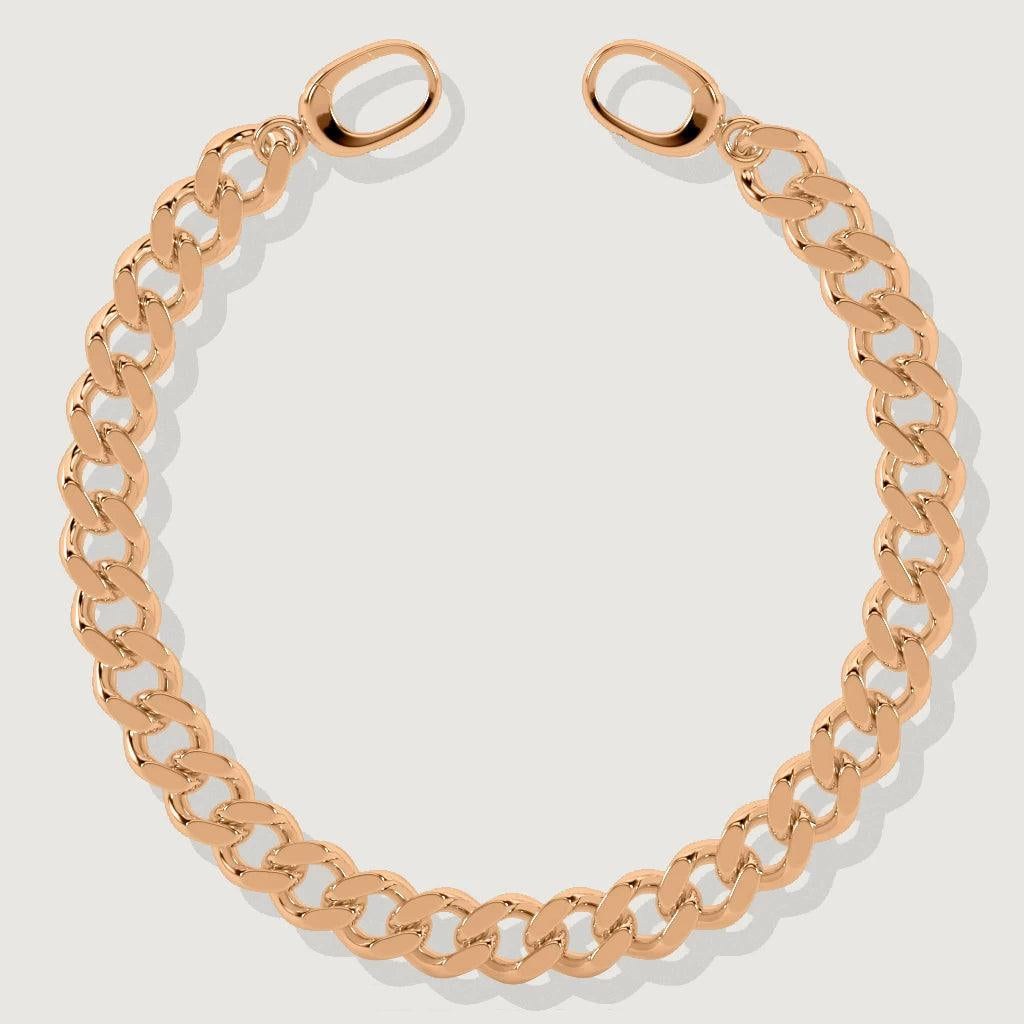 Close-up of rose gold Cuban chain bracelet laid flat