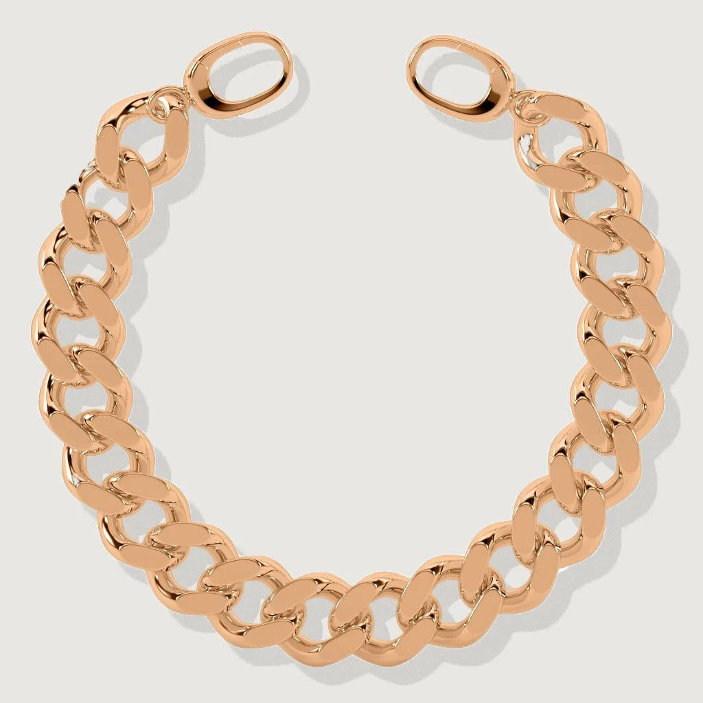 Flat lay of polished rose gold curb chain bracelet with oval clasps