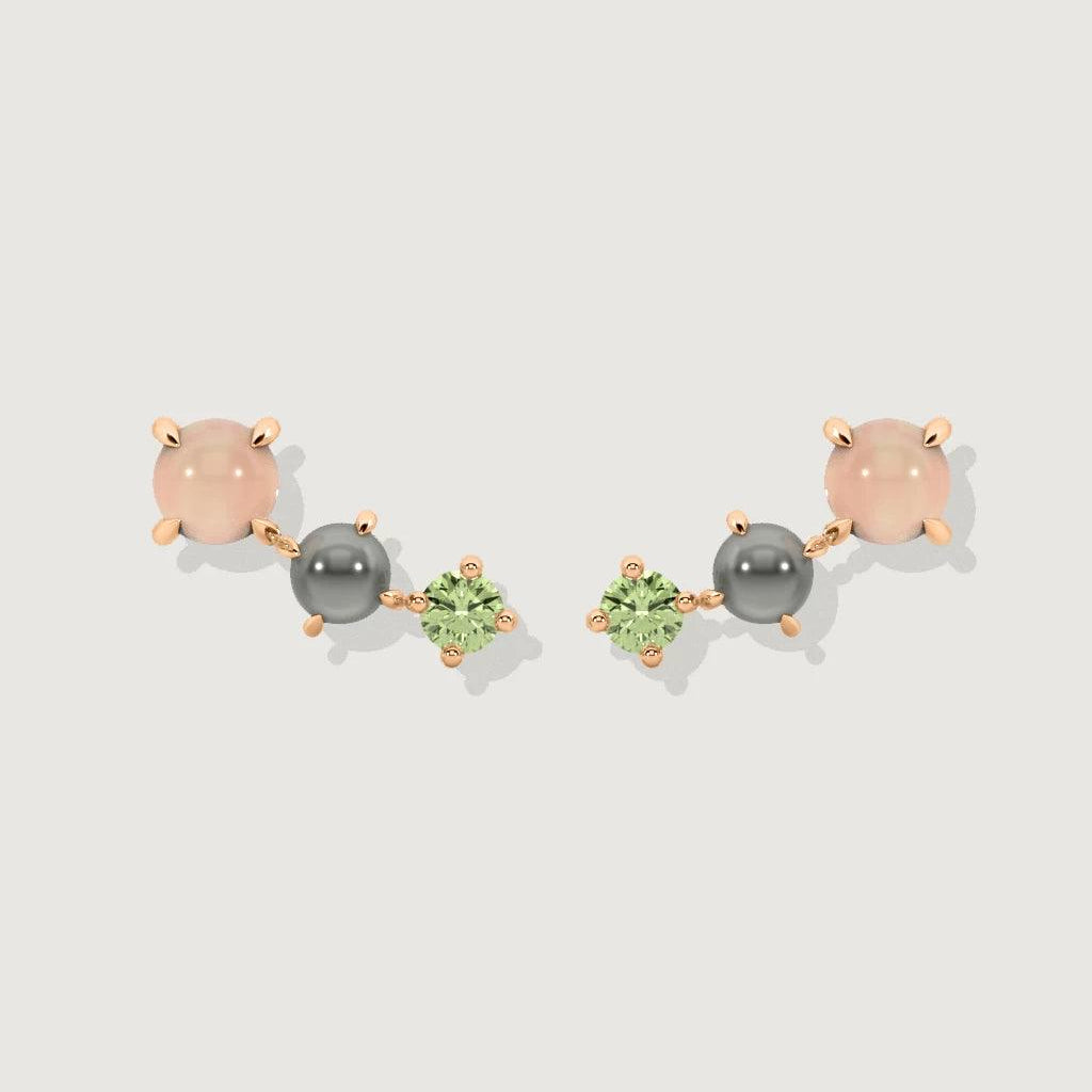 Product image of rose quartz, peridot, and grey pearl cluster stud earrings in rose gold setting on white background.