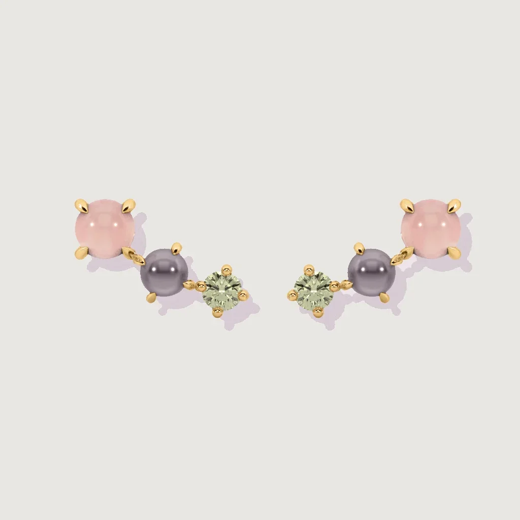 Product image of rose quartz, peridot, and grey pearl cluster stud earrings in gold setting on white background.