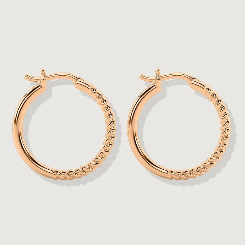 Pair of rose gold-tone hoop earrings featuring half smooth and half twisted rope detailing.