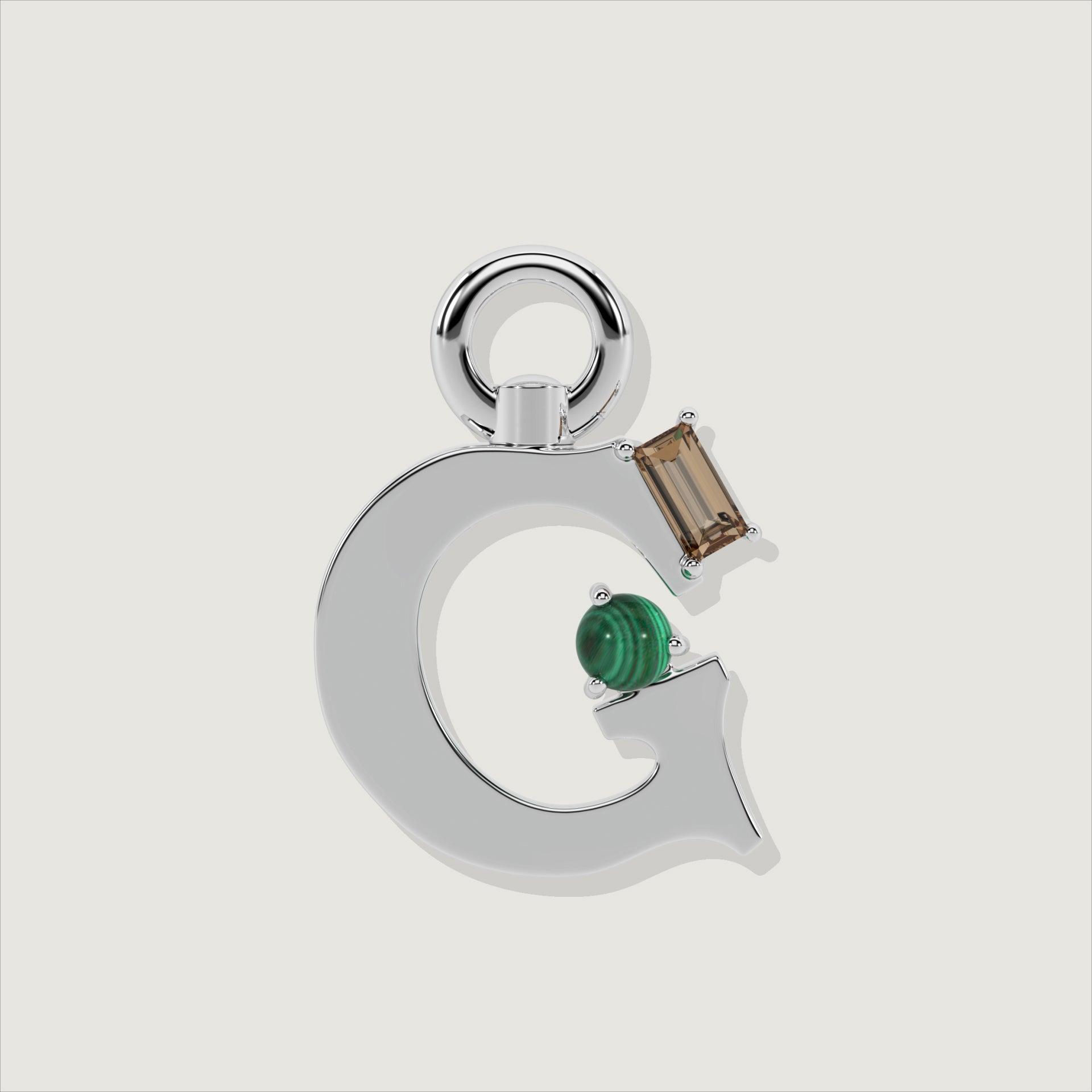Silver letter G charm with rectangular smoky quartz and round green malachite stones.