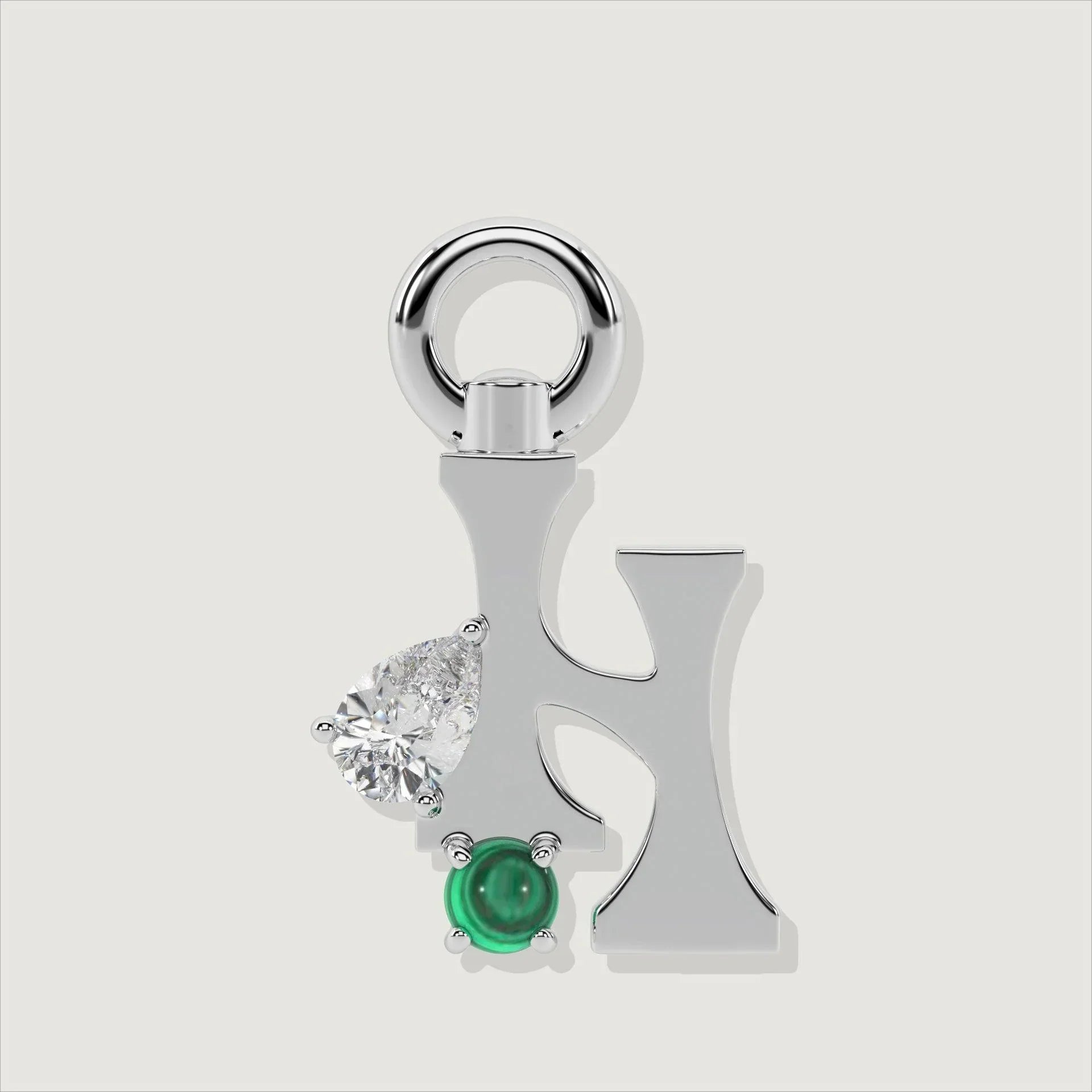 Silver letter H charm featuring round clear stone and round green malachite accent.