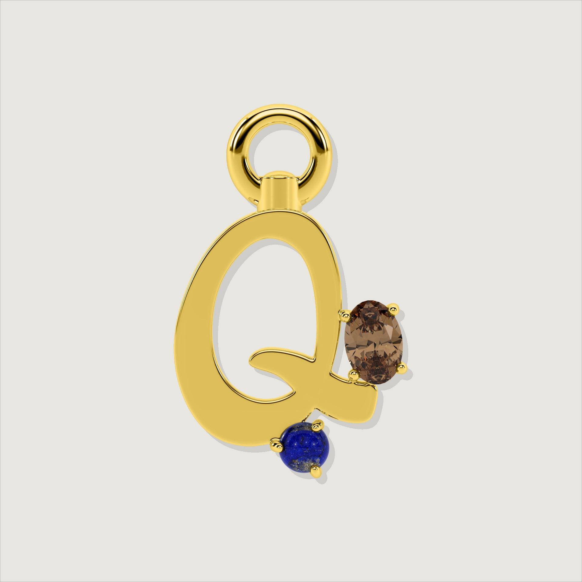 Gold letter Q charm decorated with an oval smoky quartz and a small round lapis-blue gem.