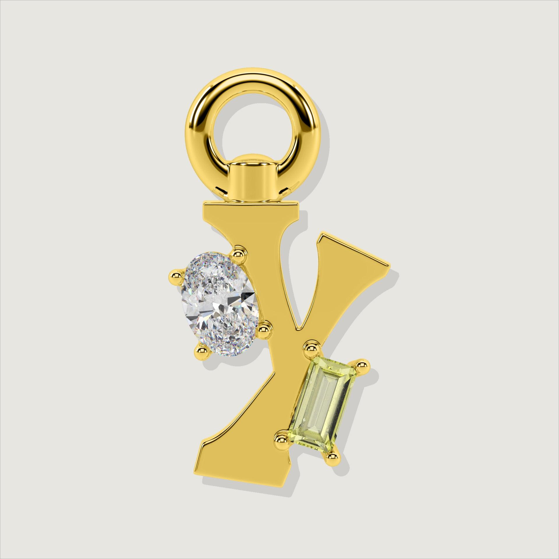 Gold letter Y charm accented with an oval clear stone and a baguette-cut yellow gemstone.