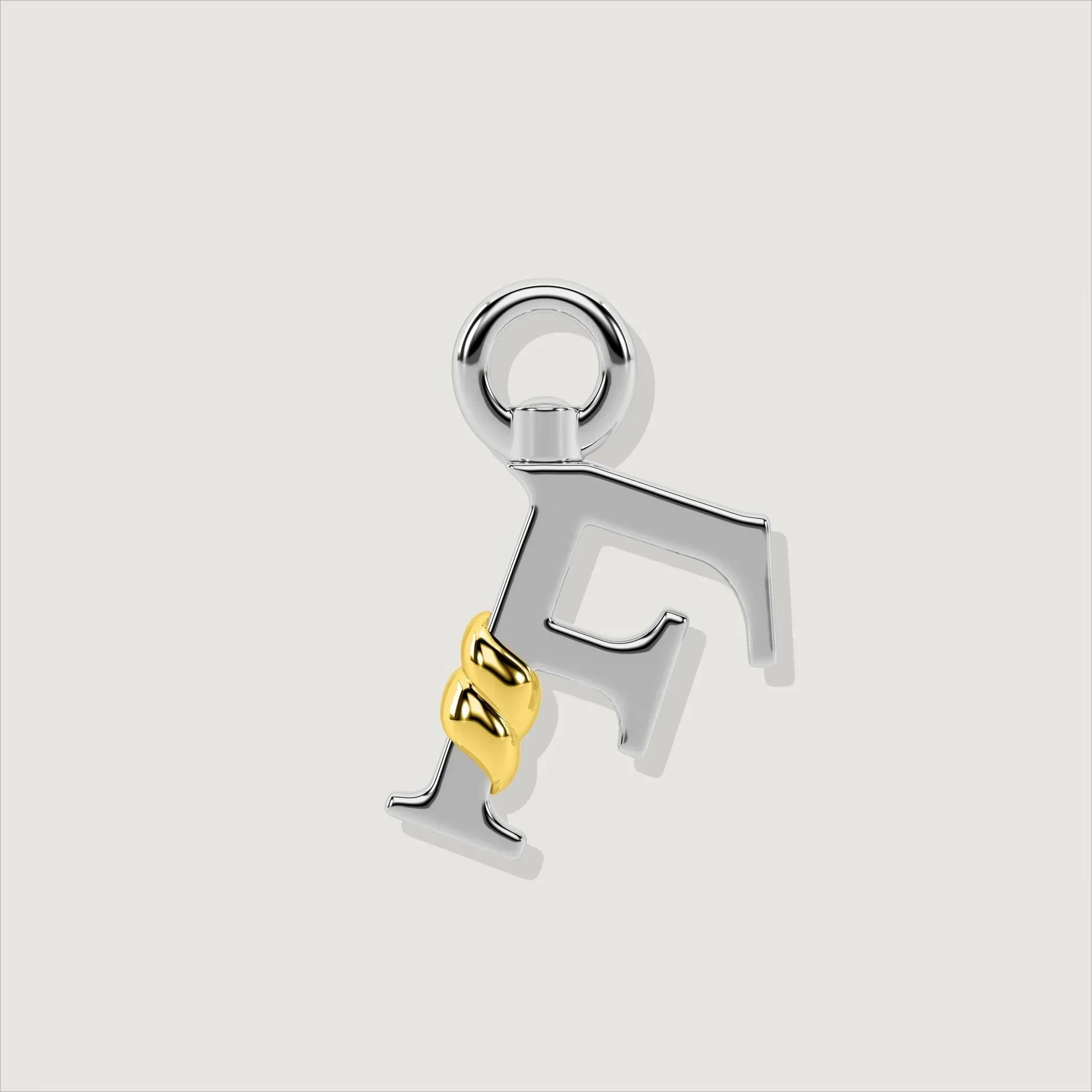 Silver letter F charm with gold rope twist detail.