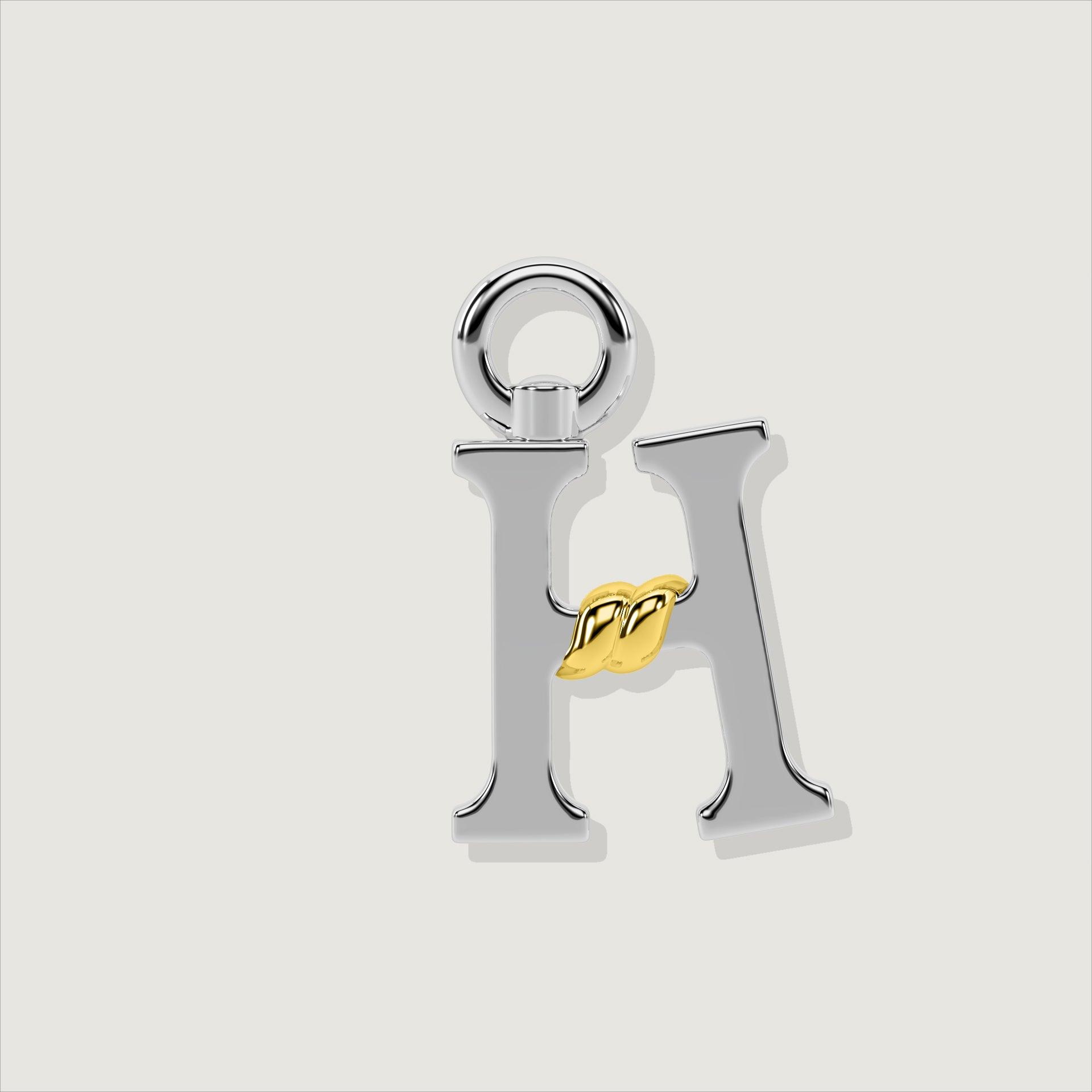Silver letter H charm with gold rope twist detail at the center.