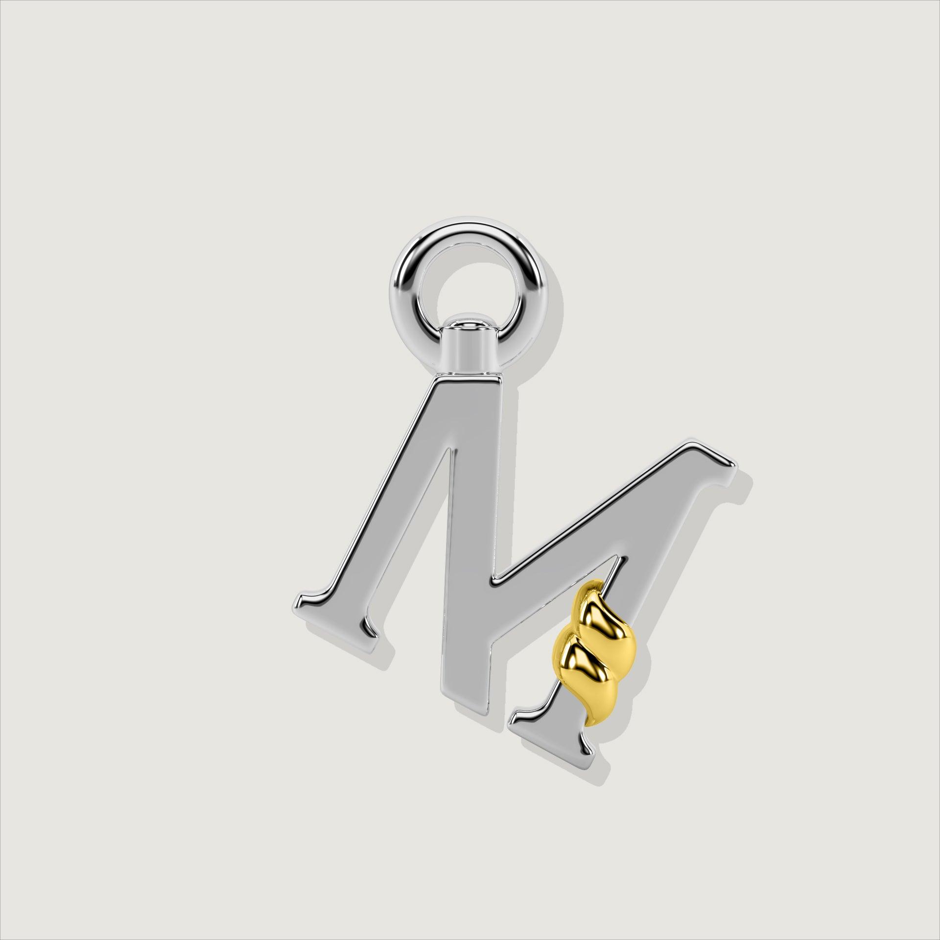 Silver letter M charm with gold rope twist detail.