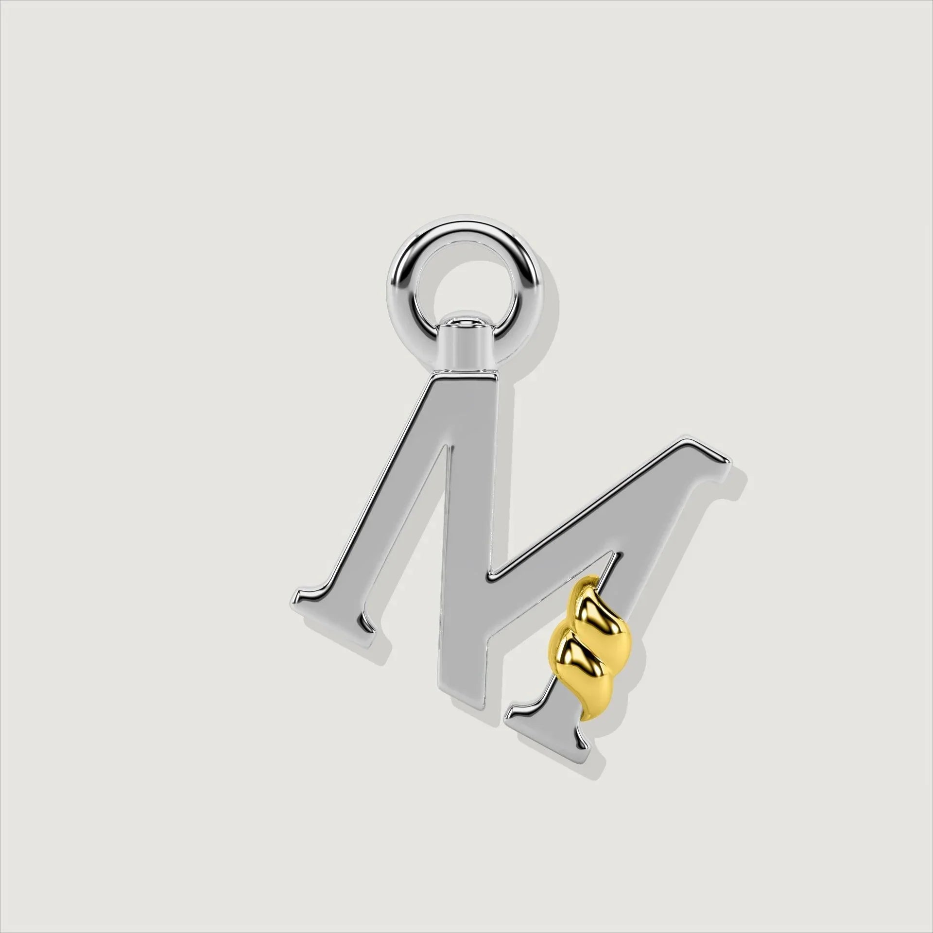 Silver letter M charm with gold rope twist detail.