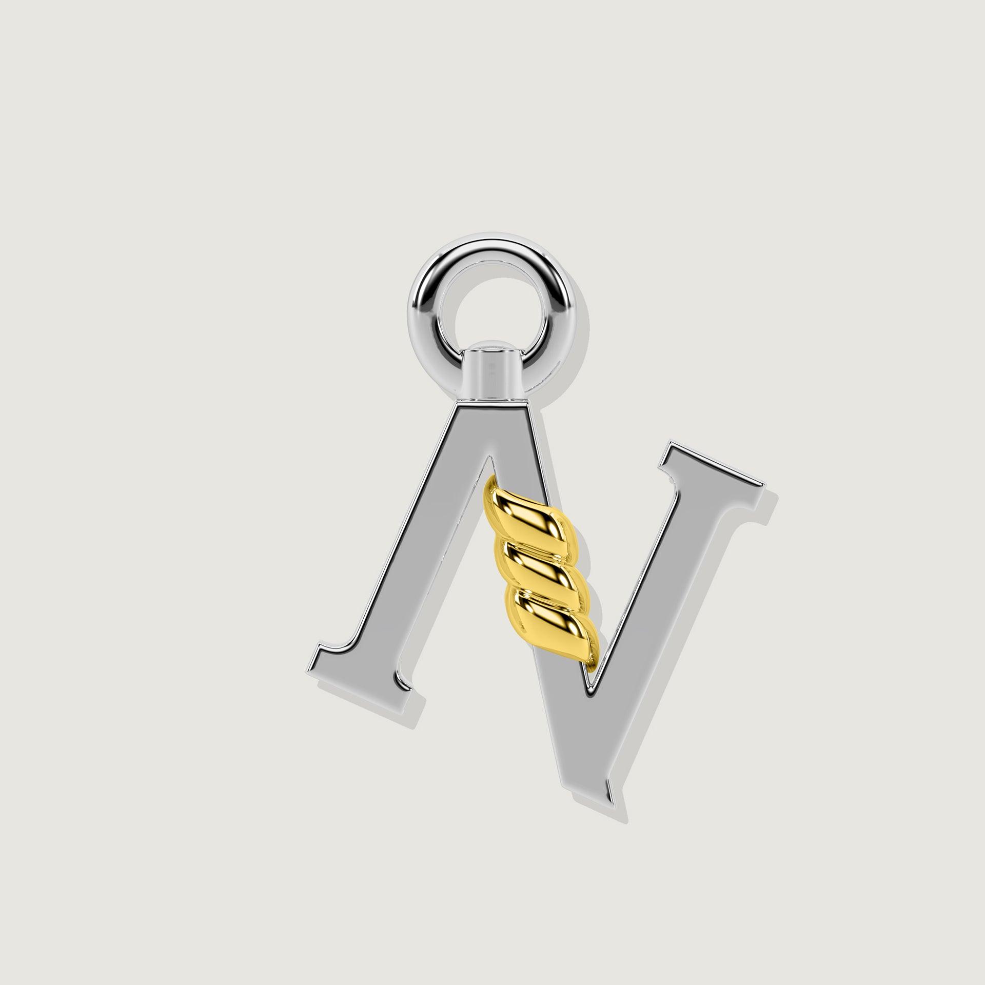 Silver letter N charm with gold rope twist detail.