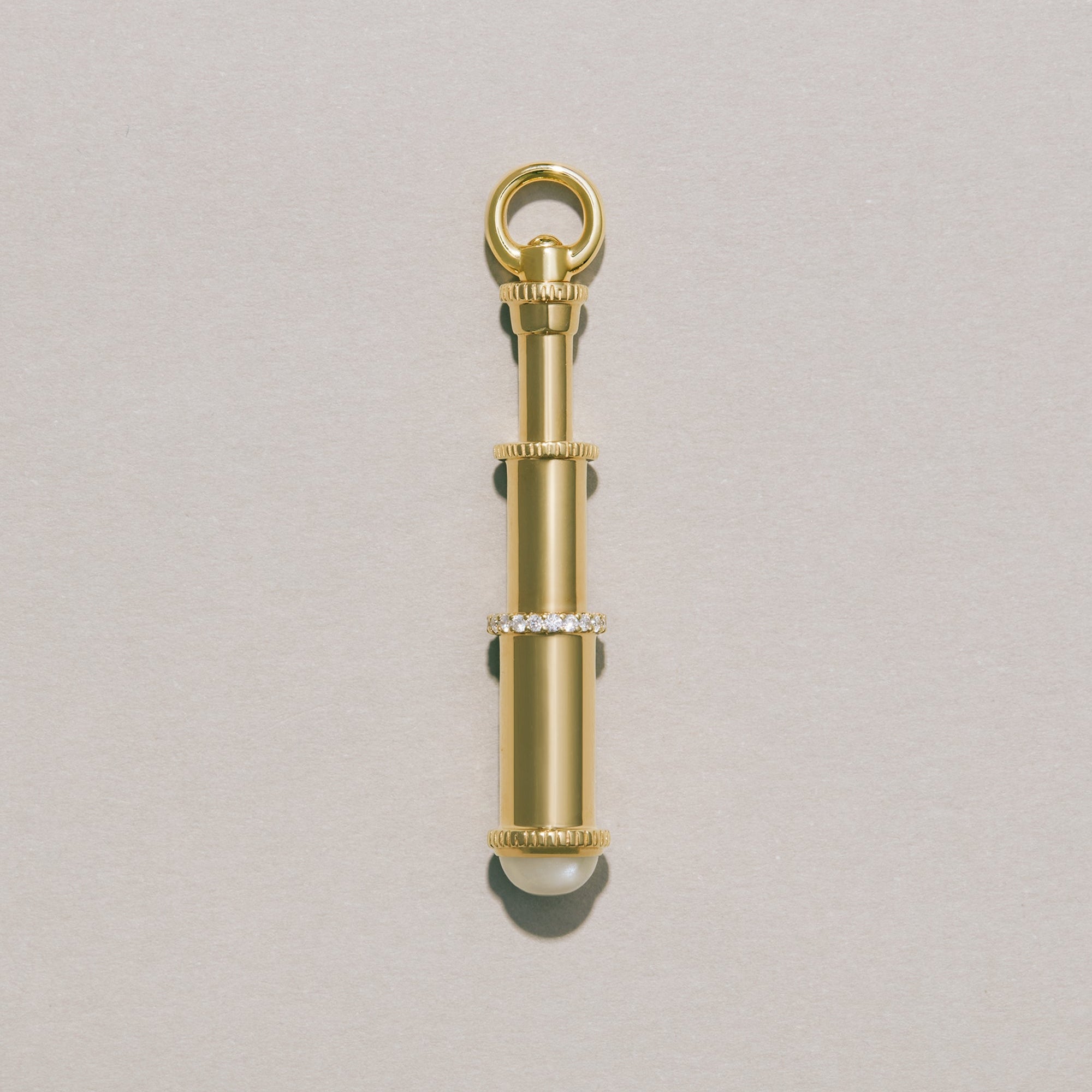 Gold telescope charm pendant with diamond accents