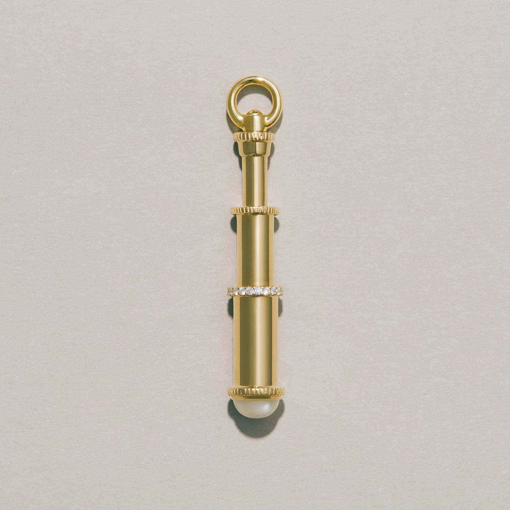 Gold telescope charm pendant with diamond accents