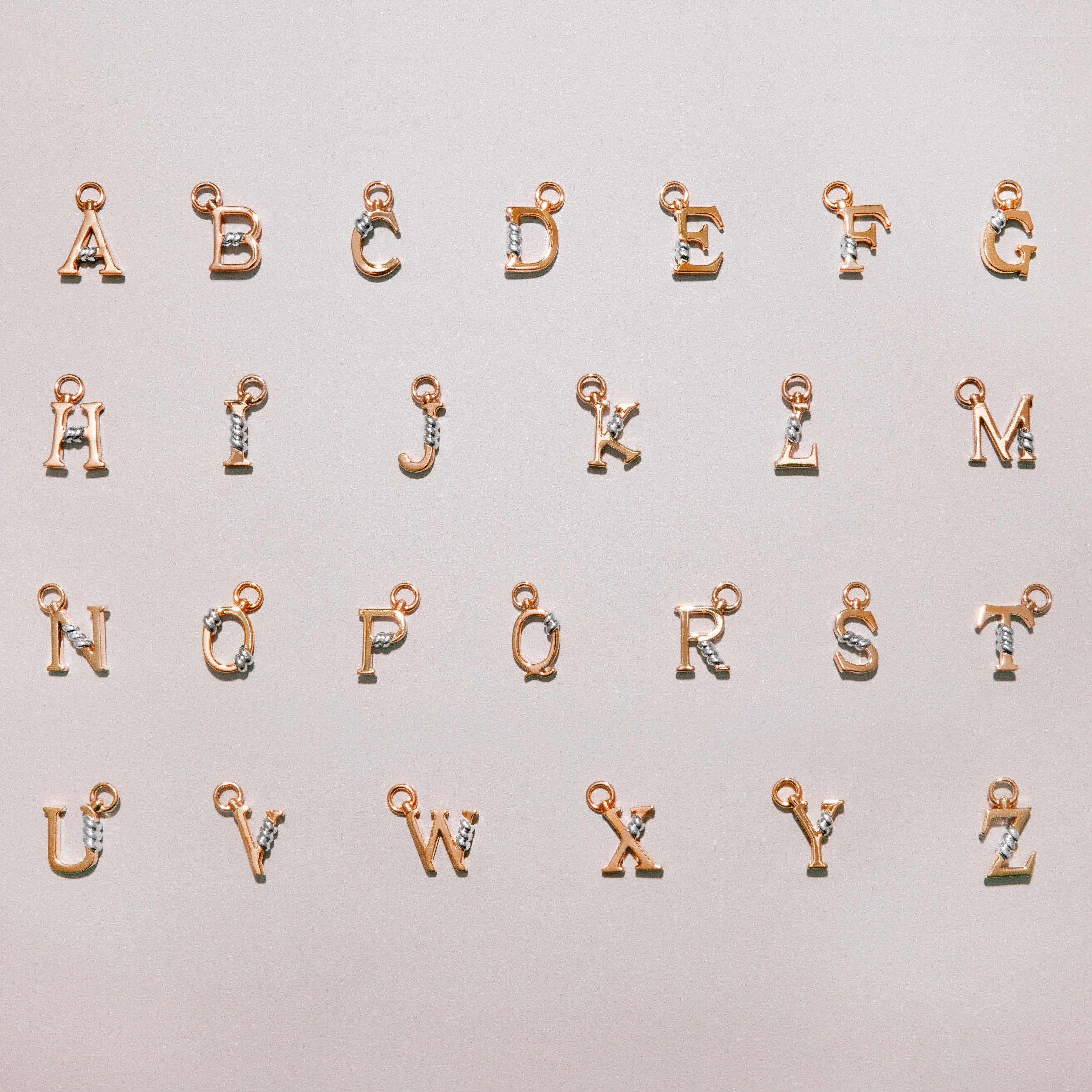 B | Unius Letter Charm