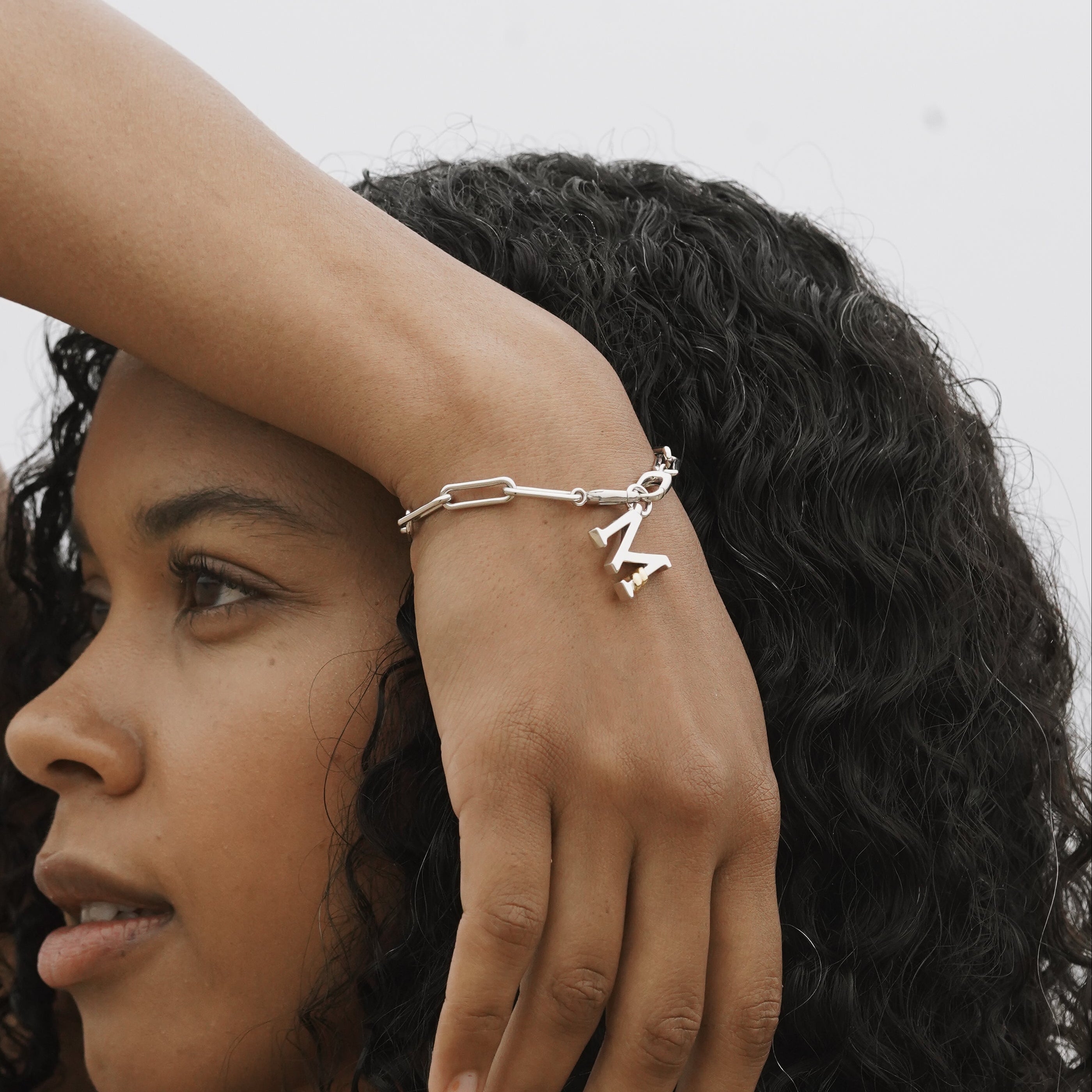 B | Unius Letter Charm