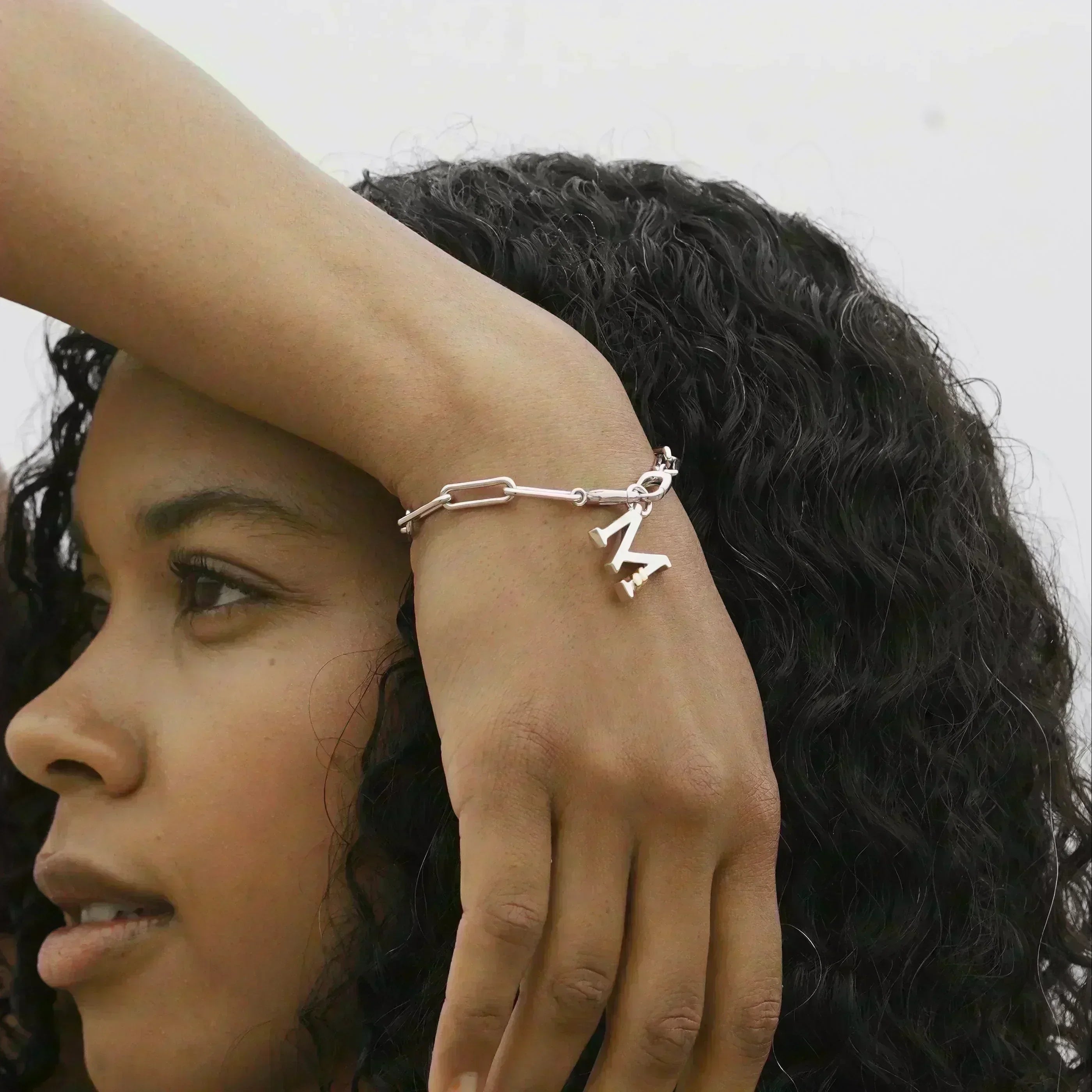 C | Unius Letter Charm