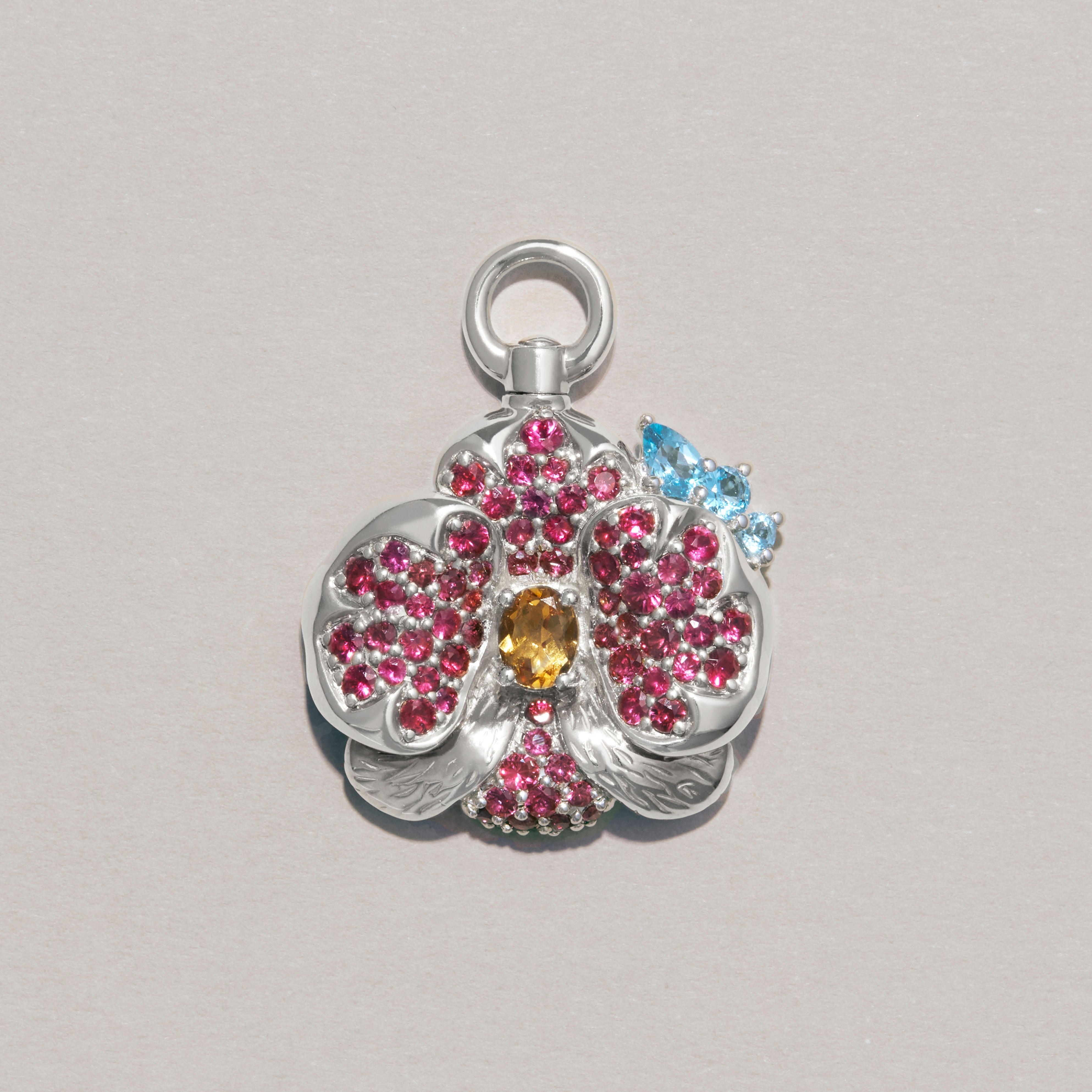 The Sacred Orchid Charm