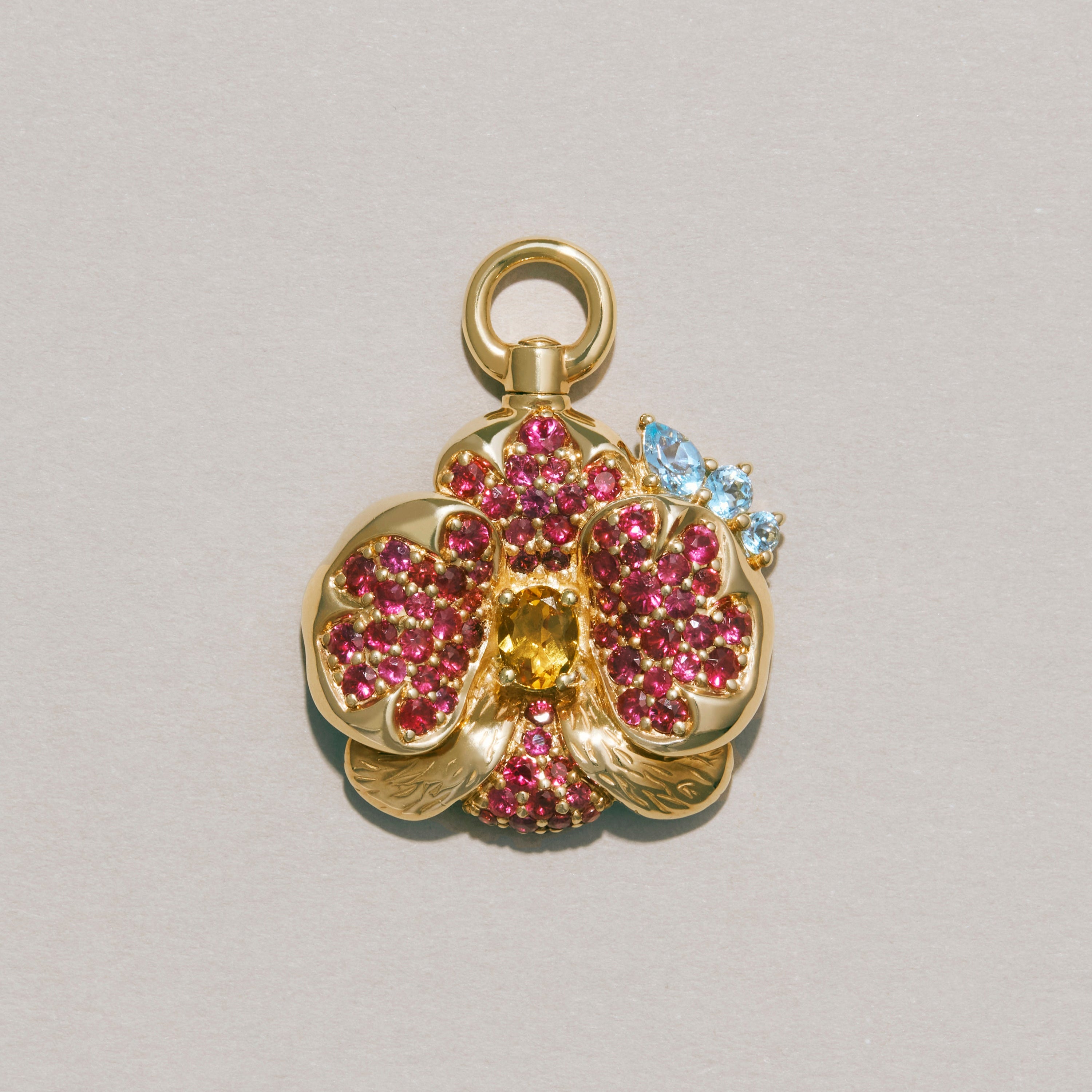 The Sacred Orchid Charm